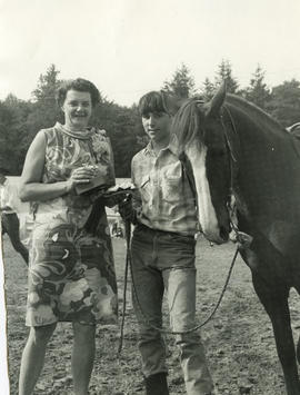 Woman, girl and horse