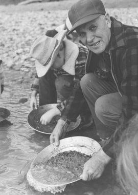 Orval Van Horlick demonstrates gold panning