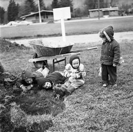 Children and wheelbarrow