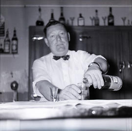 Man pouring drink