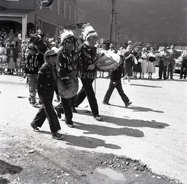 First Nations drummers and Scout [?] in parade