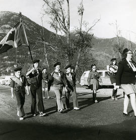 Children marching with Canadian flag