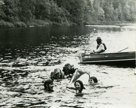 Upset canoe in race