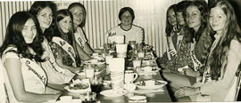 Beauty queens at table