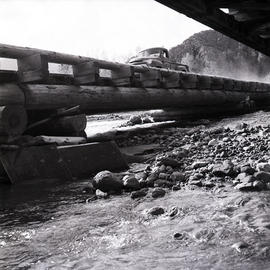 Truck crossing bridge