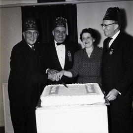 Elks members with cake