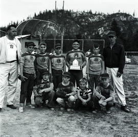 Squamish boys' sports team with trophy