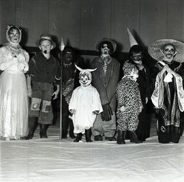 Group photo of children at costume party