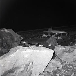 Rocks and car at night