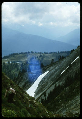 Woman climbing slope