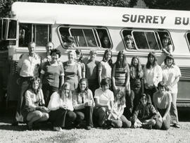 People in front of bus