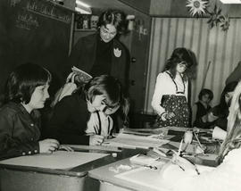 Teacher and children in classroom