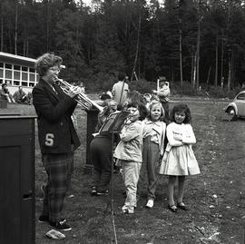 Woman playing woodwinds instrument